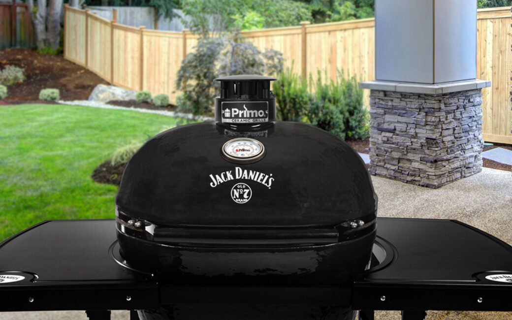 Primo grills XL charcoal jack daniels grill outside on patio